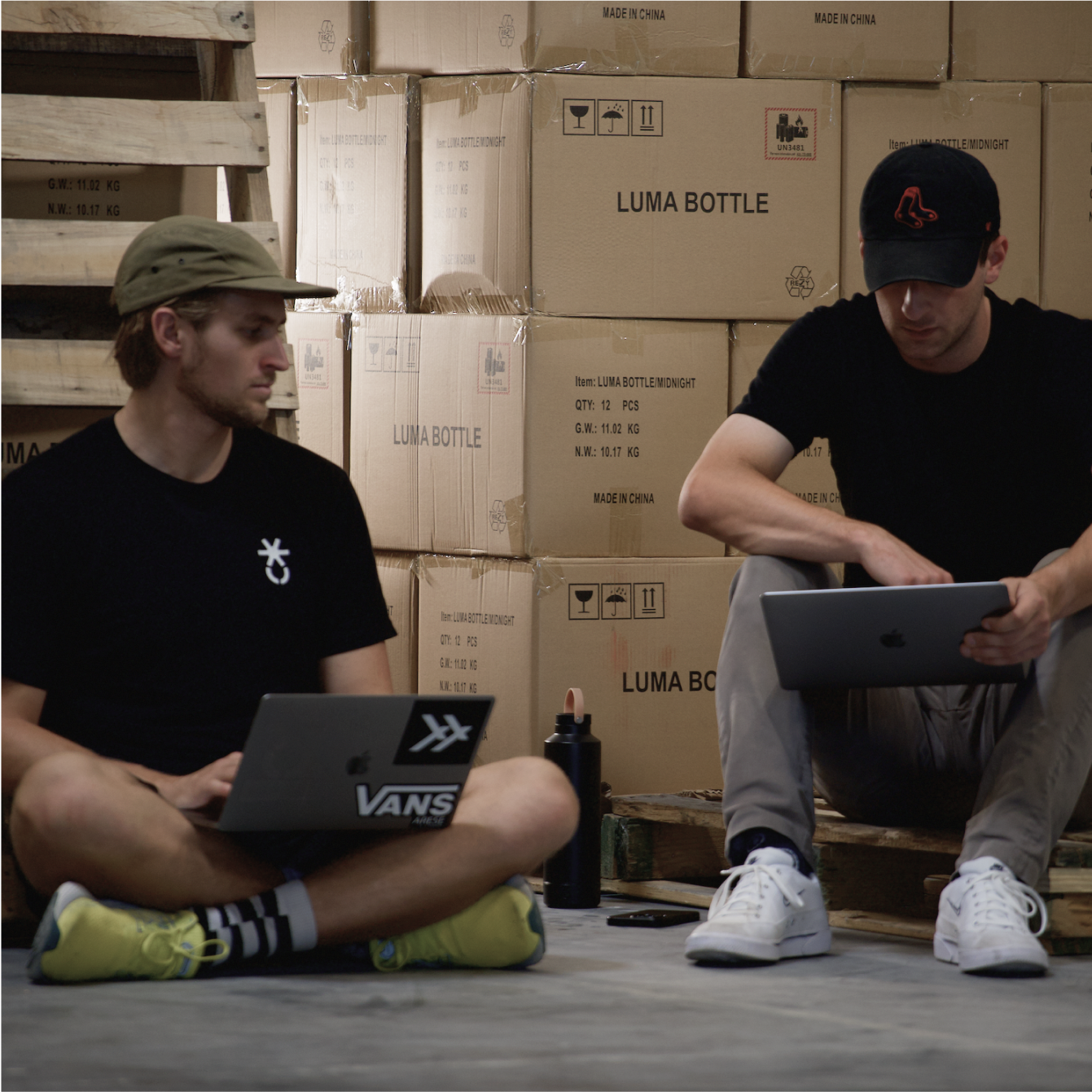 Willy and Jaden working at Luma's warehouse